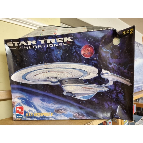 9 - Star Trek: U.S.S. Enterprise, two unmade boxed scale models, one by Bandai. (2)