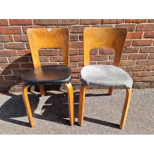 1084 - A pair of mid-century birch 'Artek 66' chairs, by Alvar Aalto, stamped.