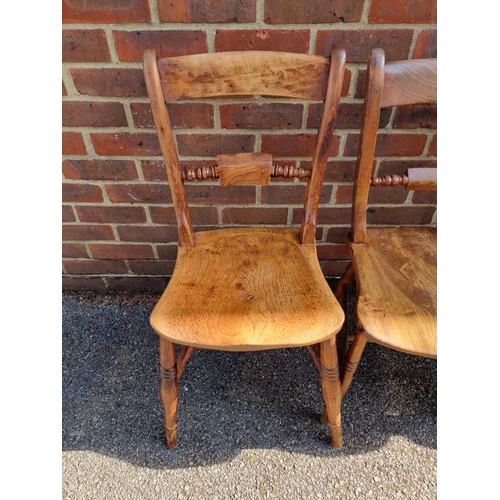 1100 - A matched set of six Victorian beech and elm bar back kitchen chairs. 