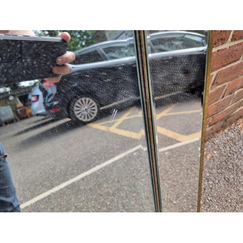 1122 - A modern gilt framed wall mirror, 79.5 x 110.5cm.