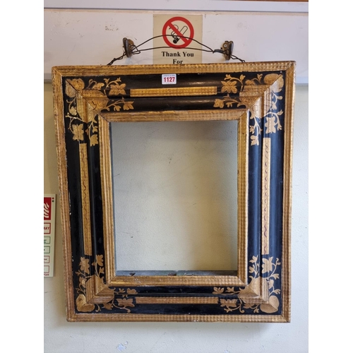 1127 - An antique ebonized and parcel gilt frame, possibly Dutch, the whole 58.5 x 52.5cm, rebate 35.5 x 28... 