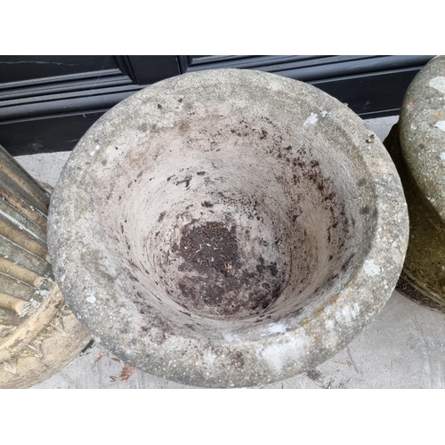 1146 - A pair of composition stone garden planters, 30cm high x 42cm diameter. 