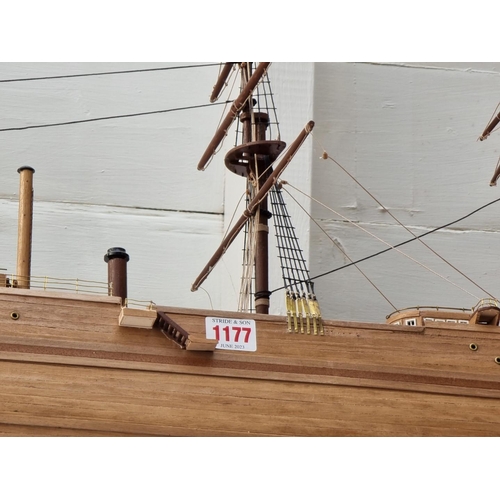 1177 - A model galleon, total length 98.5cm, on ebonized stand. 