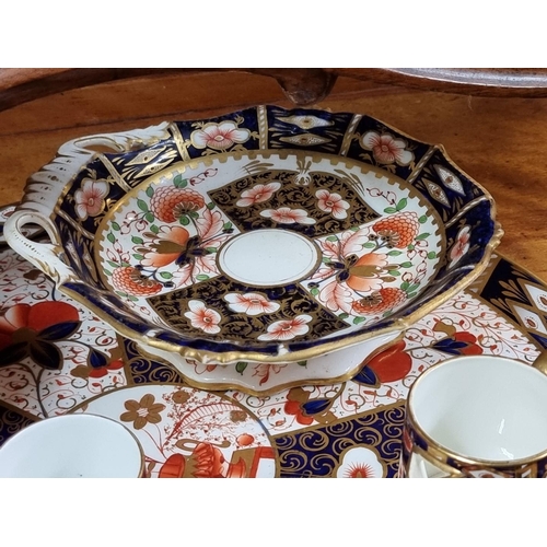 1337 - A collection of Davenport and Royal Crown Derby Imari porcelain, the tray 44cm diameter. ... 