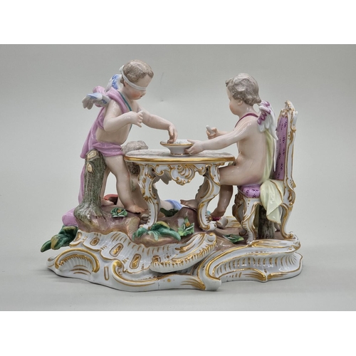 1485 - A Meissen porcelain figure group of cherubs, 22cm wide, (restoration). 