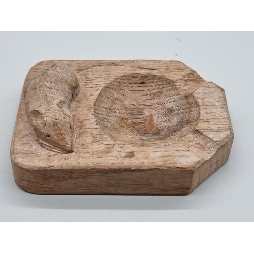 1490 - A Robert 'Mouseman' Thompson of Kilburn oak ashtray, 10cm wide.