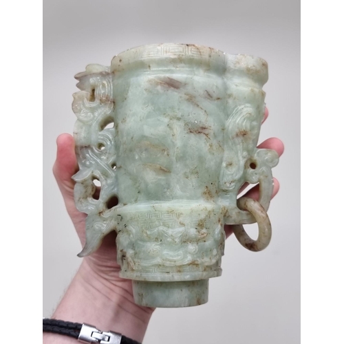 1492 - A Chinese Archaistic style carved green and russet jade ewer and cover, 22cm high, (chips to cover).... 