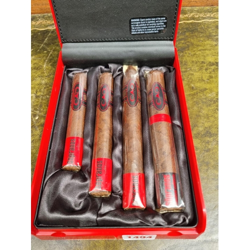 1494 - Cigars: a CAO 'The Sopranos Edition' four cigar sampler in Cadillac trunk lid presentation box, comp... 