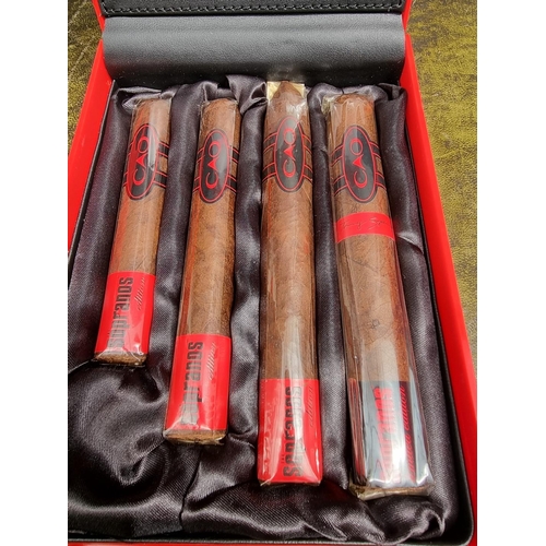 1494 - Cigars: a CAO 'The Sopranos Edition' four cigar sampler in Cadillac trunk lid presentation box, comp... 