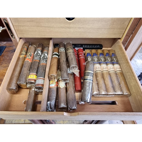 1499 - Cigars: a collection of 161 New World cigars, in a seven drawer humidor, 50cm high x 33cm wide ... 