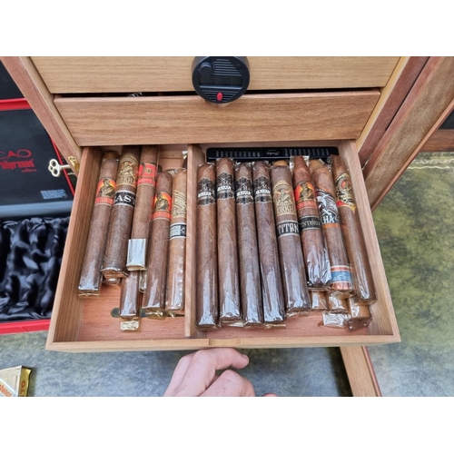 1499 - Cigars: a collection of 161 New World cigars, in a seven drawer humidor, 50cm high x 33cm wide ... 