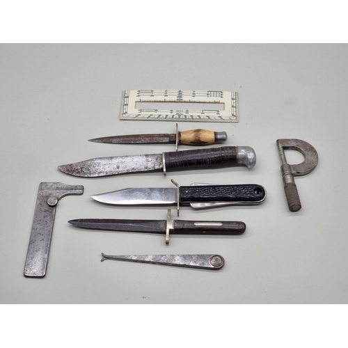 1506 - A small collection of vintage knives, gauges and similar, to include an RAF Air Crew survival knife.... 