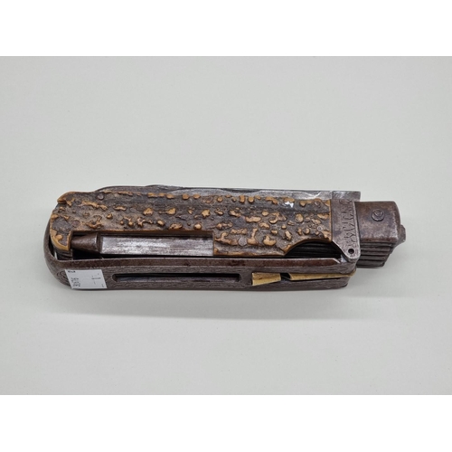 1509 - A rare large 19th century antler handled folding gamekeeper's knife, 16.5cm long when closed, (worm ... 