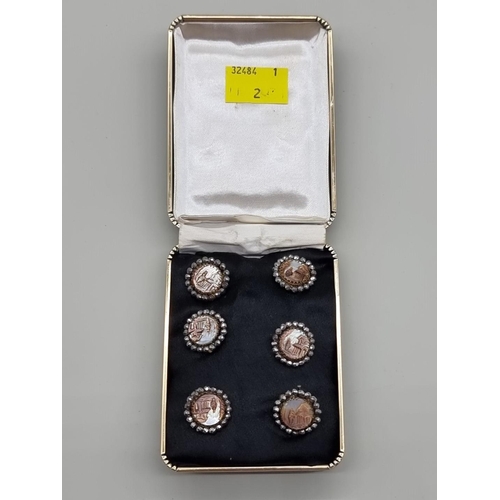 1515 - A set of six 19th century carved mother of pearl and marcasite buttons, each 17mm diameter.... 