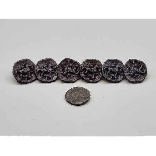 1521 - A set of six antique metal buttons, probably 17th century, each relief decorated with a horse and ri... 