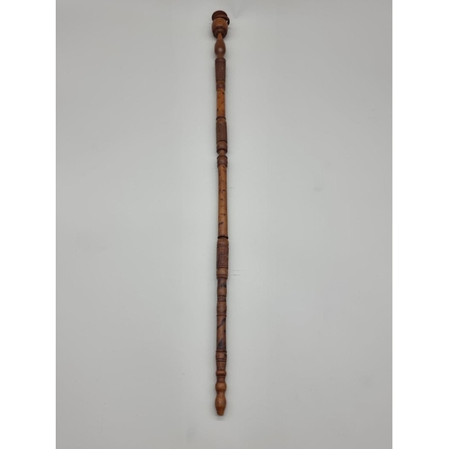 1522 - Ethnographica: an African tribal pipe, 65.5cm long. 