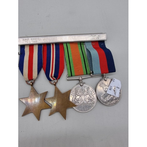 1526 - Medals: a World War II group of four, with RAF 'Service and Release Book', to 1144874 Cpl Gordon Cec... 