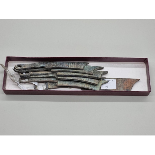 1529 - A small group of Chinese bronze knife money, longest 16.5cm.