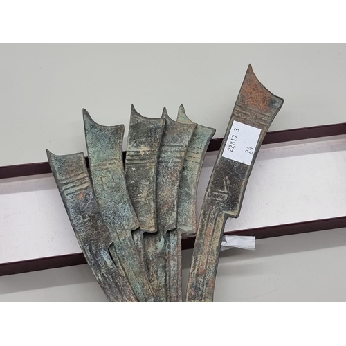 1529 - A small group of Chinese bronze knife money, longest 16.5cm.