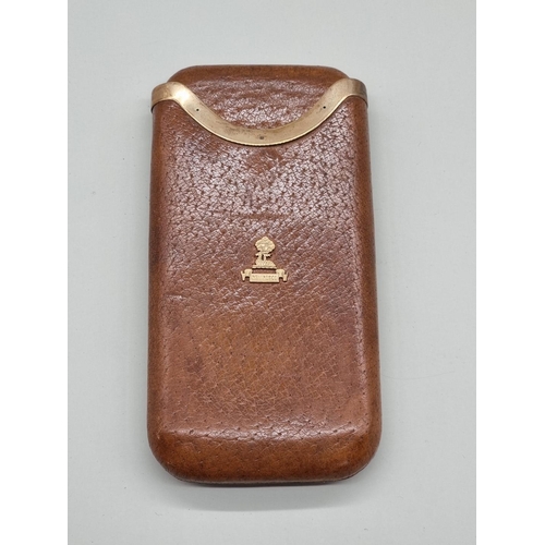 1530 - A vintage 9ct gold mounted tan leather cigar sleeve, 16cm long. 