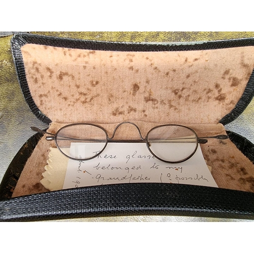 1532 - A pair of vintage British Military safety spectacles, with folding mesh sides, stamped broad arrow t... 