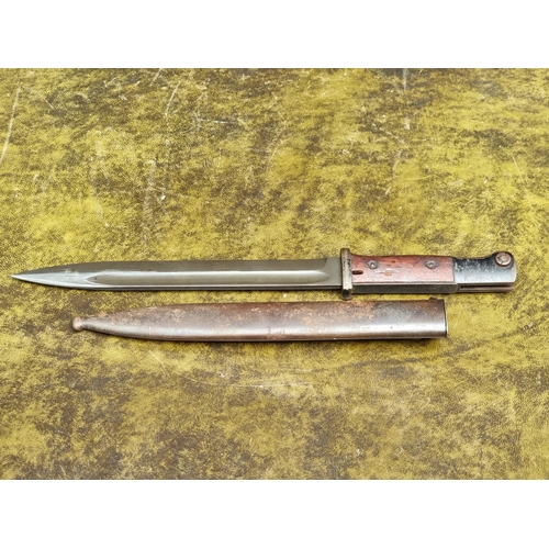 1591 - A K98 bayonet and scabbard, with 25cm blade.