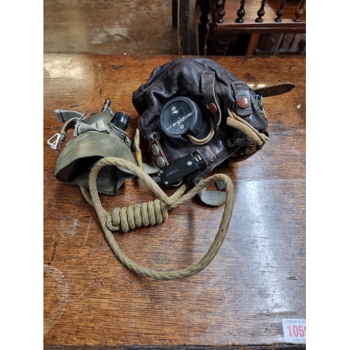 1603 - A World War II RAF pilot's leather C Type flying helmet, with earphones and wiring loom; together wi... 