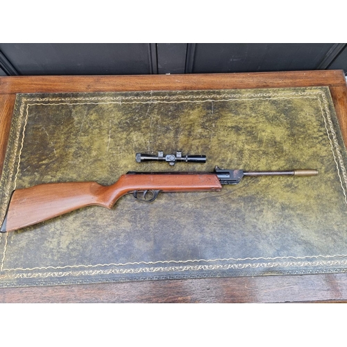 1606 - A vintage Spanish El Gamo .22 cal break action air rifle, Serial No.129718, with Webley scope; toget... 