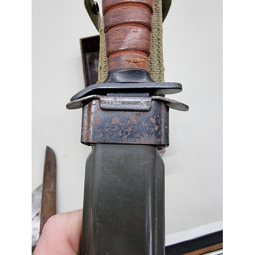 1609 - A US M3 fighting knife in M8A1 sheath; together with a Japanese knife in sheath; a shortened P1856 A... 