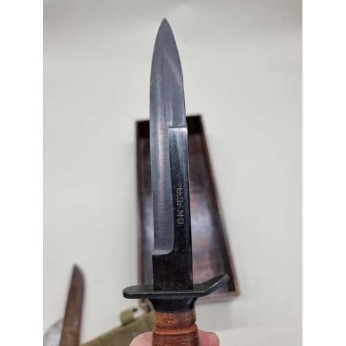 1609 - A US M3 fighting knife in M8A1 sheath; together with a Japanese knife in sheath; a shortened P1856 A... 