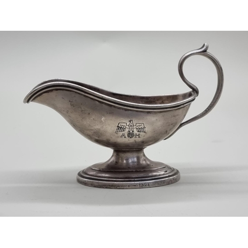 1612 - A German silver plated sauce boat, stamped 'A Krupp Berndorf 12cl', later engraved, 17.5cm long.... 