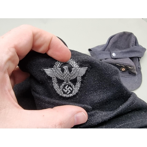 1624 - Three German Third Reich caps, comprising: Police Officer's M43; a Luftwaffe M43; and a Luftwaffe Of... 