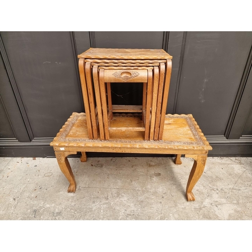 1635 - An Indian carved hardwood rectangular low occasional table, 91.5cm wide; and a matching nest of... 