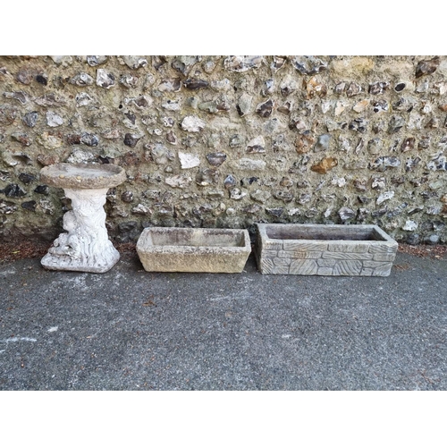 1636 - A reconstituted white painted bird bath; together with two rectangular stone planters.... 