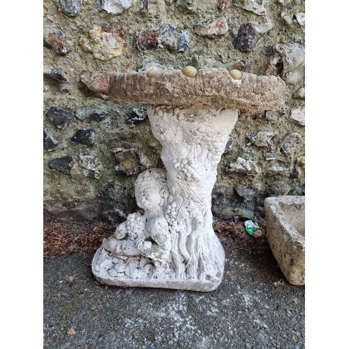 1636 - A reconstituted white painted bird bath; together with two rectangular stone planters.... 