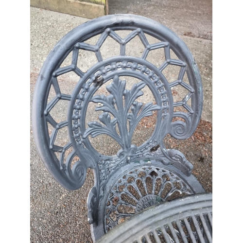 1639 - A black painted aluminium garden table, 80cm diameter; together with four chairs.... 