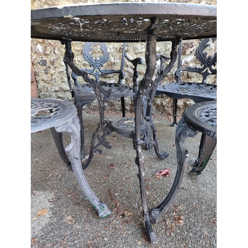 1639 - A black painted aluminium garden table, 80cm diameter; together with four chairs.... 