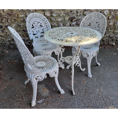 1640 - A white painted aluminium garden table, 69cm diameter; together with three chairs.