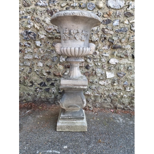 1649 - A composition stone Campana urn and pedestal, 113cm high.