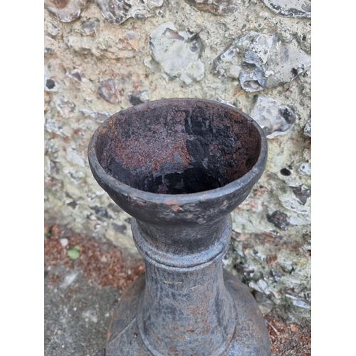 1652 - A black painted cast iron chimenea, 105cm high.