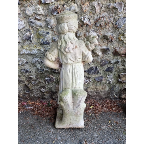 1653 - A reconstituted stone figure of a lady, 78cm high.