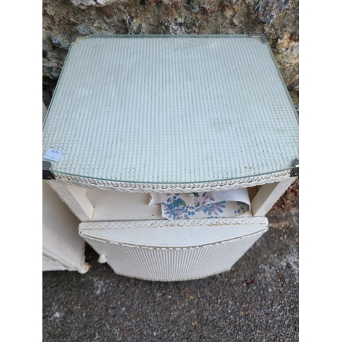 1658 - Two similar Lloyd Loom bedside cupboards.