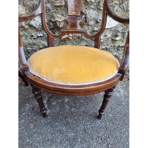 1669 - Two Edwardian inlaid elbow chairs.