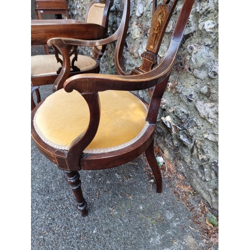 1669 - Two Edwardian inlaid elbow chairs.