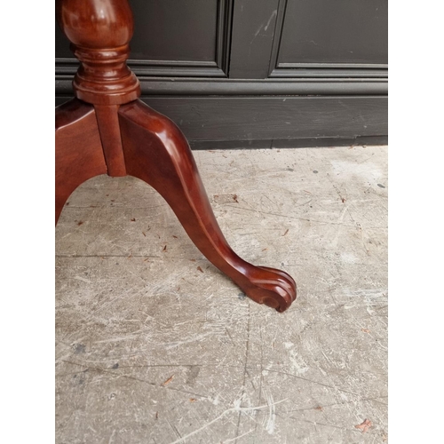 1671 - A reproduction mahogany tripod table, 59.5cm wide.