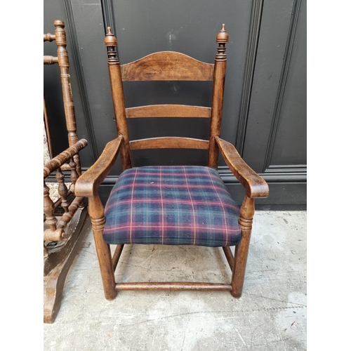 1673 - A child's rocking chair; together with a child's elbow chair and a folding child's chair.... 