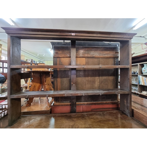 1067 - An antique walnut and inlaid dresser and rack, 149cm wide.    