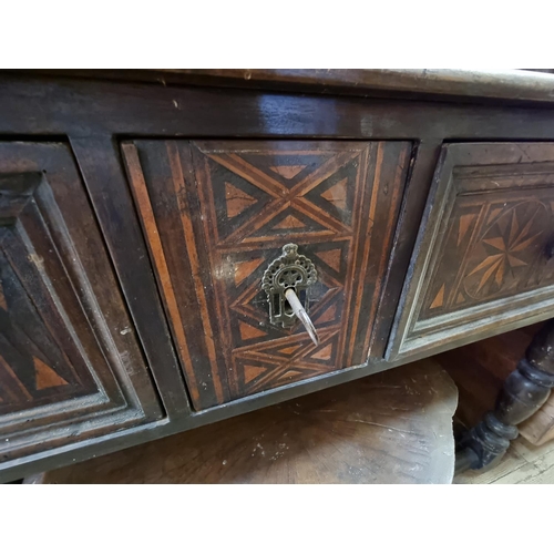 1067 - An antique walnut and inlaid dresser and rack, 149cm wide.    