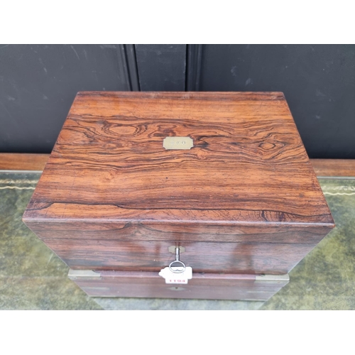 1194 - A Victorian mahogany and brass bound casket; together with another similar walnut example. (2)... 