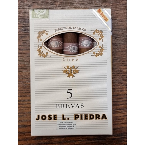 1496 - Cigars: a sealed box of 5 Jose L Piedra 'Brevas' cigars.